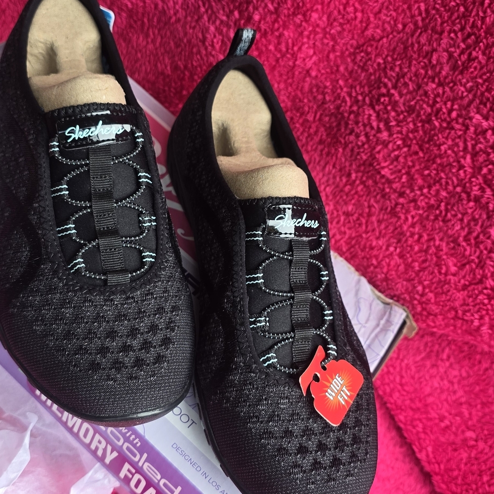 Skechers Black Sneakers with Blue Accents